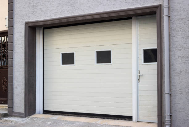 istock White garage door in grey apartment building. 1363388218