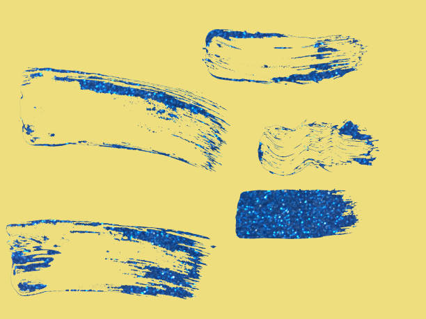 istock blue strokes of glitter on yellow background 1363390543