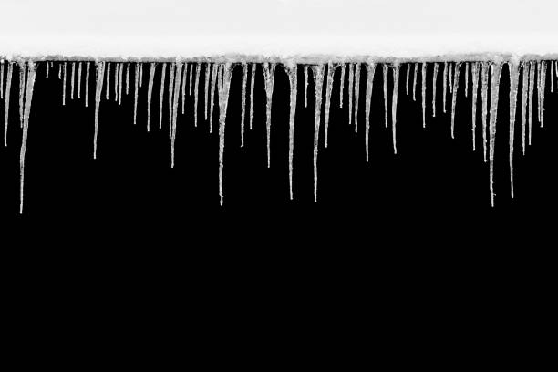 istock natural icicles isolated on a black background 1363392915