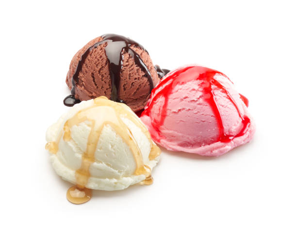 istock Vanilla, chocolate and strawberry ice cream scoops with syrup 1363406002