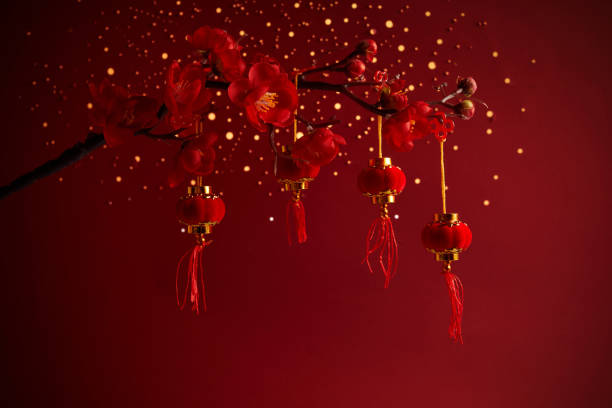 istock Chinese New Year background with sakura branch and lanterns 1363413466