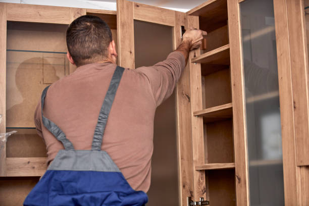 istock Handyman making kitchen wall cabinets in the apartment. 1363413541