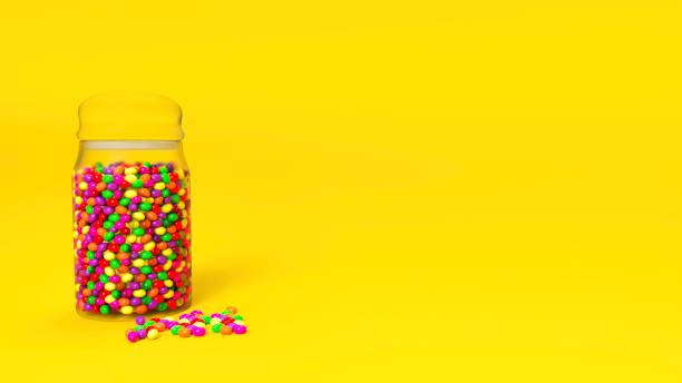 Multicolored sweets in a jar