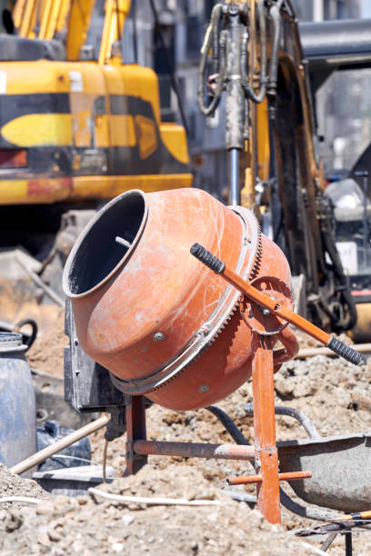 istock Portable cement mixer on a heavy construction site. 1363415174