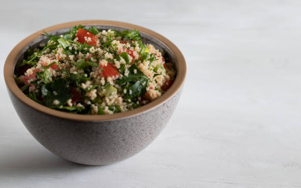 istock Traditional Arabic salad Tabbouleh with copy space on a white background 1363416206