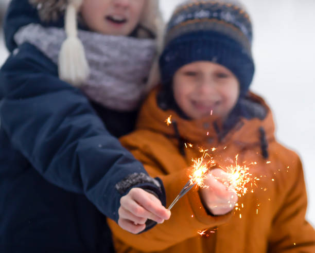 istock Children admire sparklers 1363417975