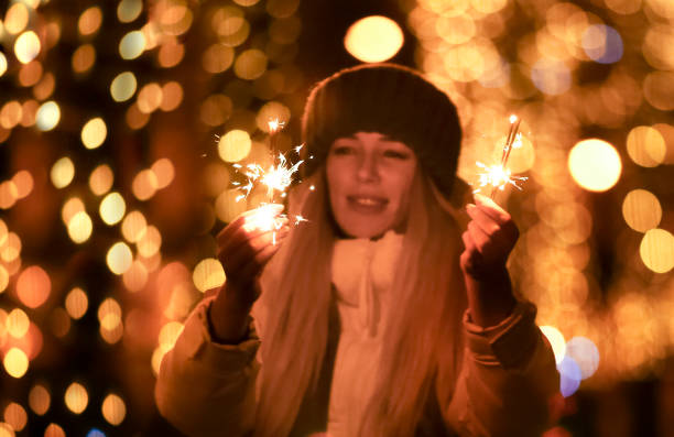 istock Young woman with sparklers 1363418019