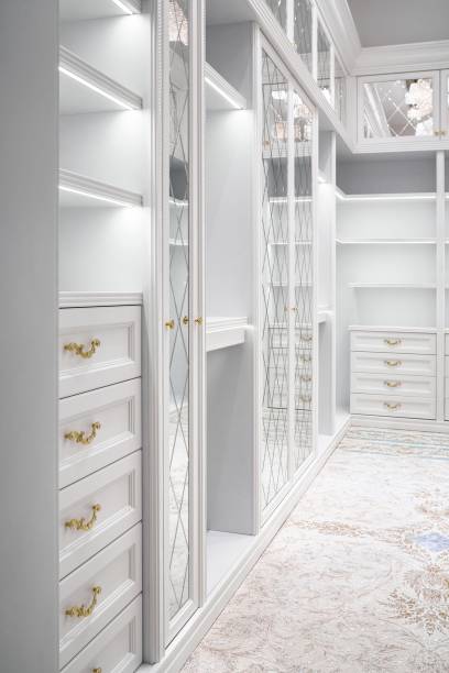 istock Luxury white walk-in closet led lamps with mirror facades 1363421333