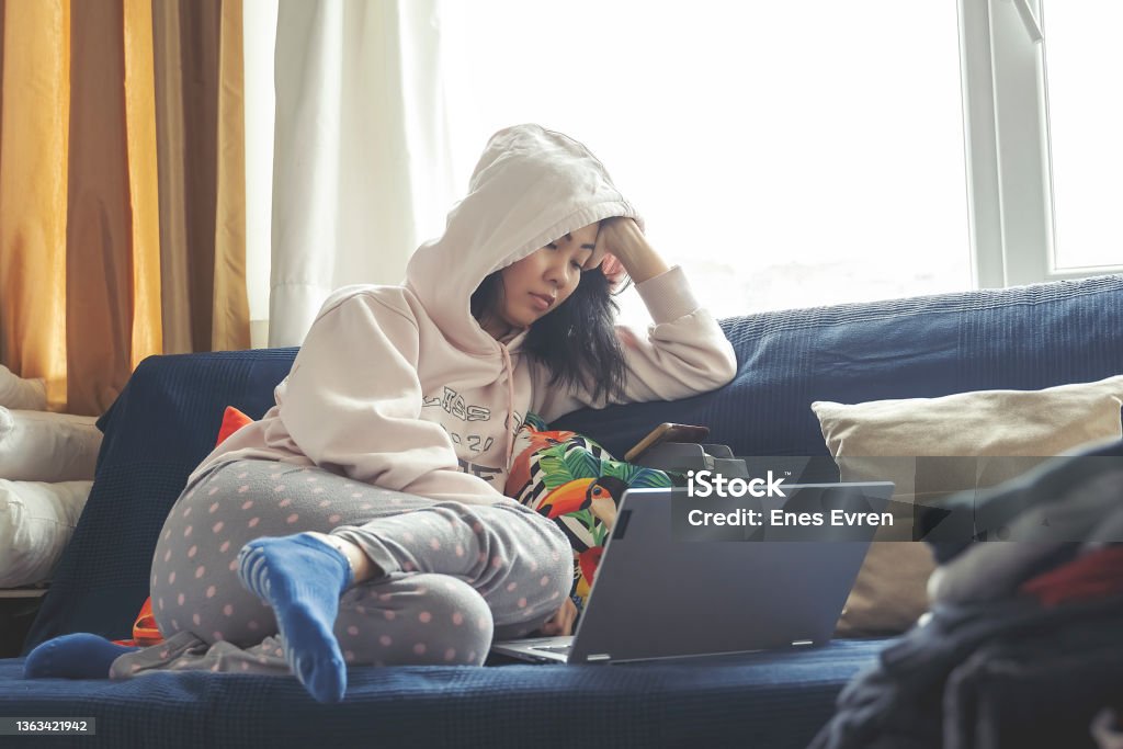 Resting at home Laziness, relaxing at home, pajamas Laziness Stock Photo