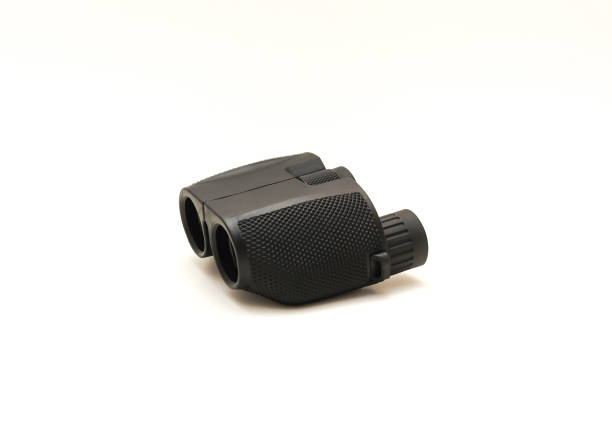 istock Side view a black compact Binoculars with rubber armor ergonomic steady grip isolated on white 1363422028