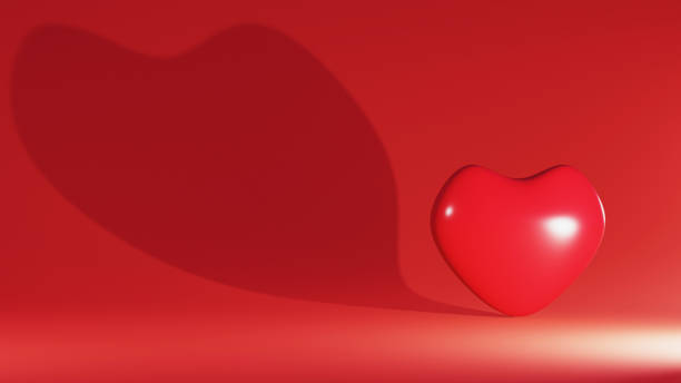 istock red heart and shadow on a red background, Valentine's day, 3d rendering 1363423529