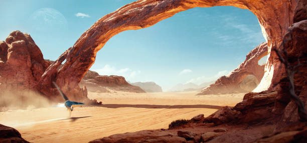 Fantastic Sci-fi landscape of a spaceship on a sunny day, flying over a desert with amazing arch-shaped rock formations. stock photo