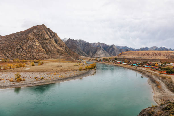 istock Mountain river surrounded by high rocks in Altai 1363423806