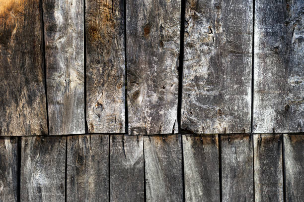 istock Stacked old wooden planks close up 1363432280