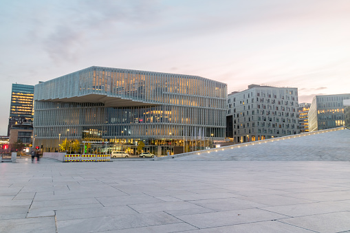Oslo, Norway - September 24, 2021: Sunrise view with Deichman - Oslo Municipality's library and Norway's largest public library.