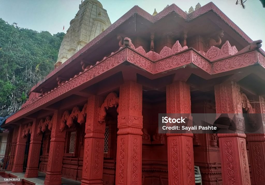 Beautiful view of the Ganpatipule Temple, Ganesha Temple. Ganesha idol carved on Wall. Ganpatipule, Maharashtra, India: January 02, 2022: Beautiful view of the Ganpatipule Temple, Ganesha Temple. Ganesha idol carved on Wall. Ancient Stock Photo