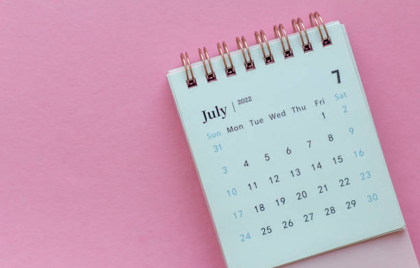 istock Desk calendar for July 2022 on pink background with copy space. 1363437767