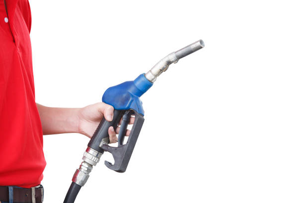 istock Hand holding fuel pump nozzle isolated on white background. Clipping path. 1363438374