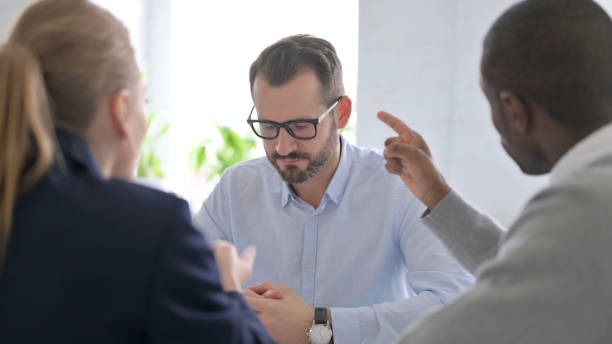 istock Young Business People Scolding Colleague 1363438885
