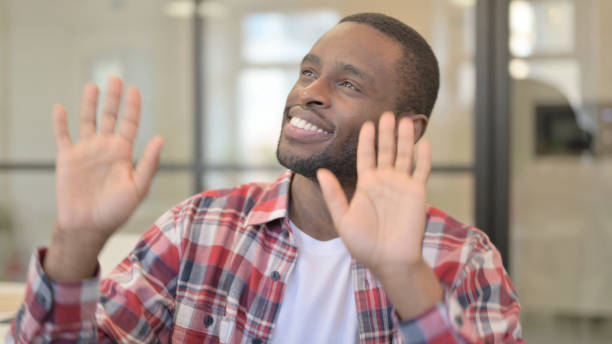 istock Happy African Man Dancing in Office 1363442531