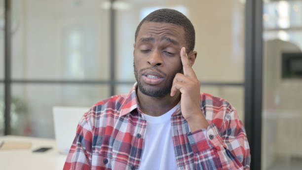 istock Portrait of African Man having Headache 1363442568