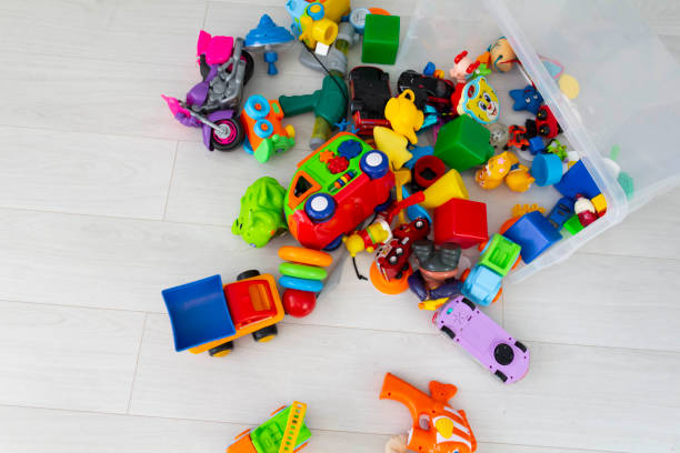 istock Bright, colored, monophonic plastic cubes lie on the floor, on the laminate. 1363445972