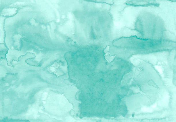 istock watercolor smudges and stains, hand-drawn paint background. light gentle neutral aquamarine background for cards, fabrics, any design. 1363446259