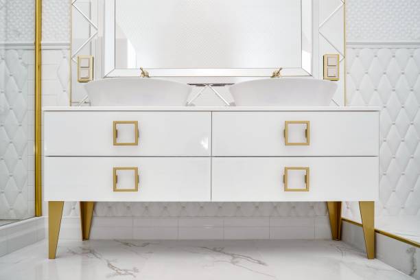 istock Elegant cabinet with vessel sinks by mirror in bathroom 1363449797
