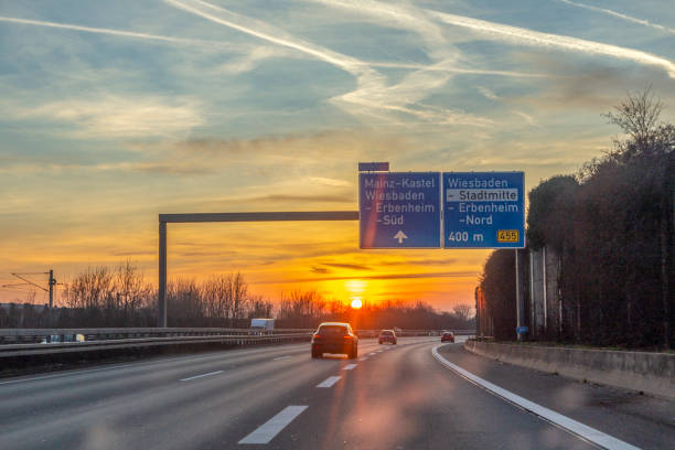 istock riding on a german highway in direction sunset 1363450929