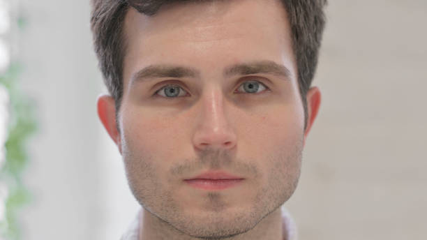 istock Face Close Up of Man Looking at the Camera 1363455266