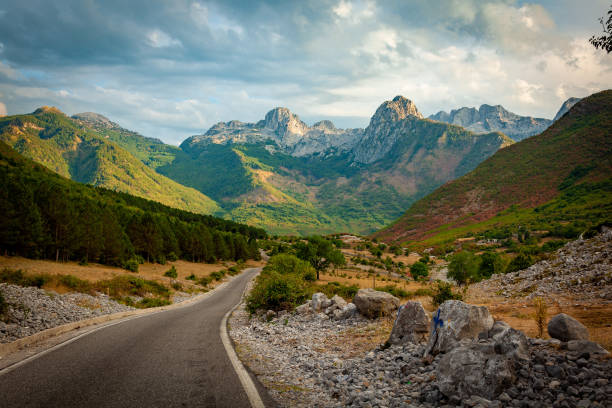 Picturesque valley in Bogë, Albania, near Theth Valley, photographed at evening sun, magic hour Picturesque valley in Bogë, Albania, near Theth Valley, photographed at evening sun, magic hour albania stock pictures, royalty-free photos & images