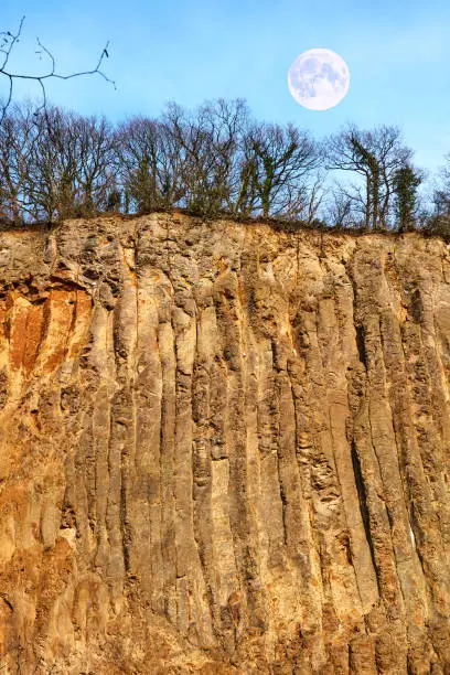 High basalt wall with volcanic origin at the Rhine near Bonn in Germany.