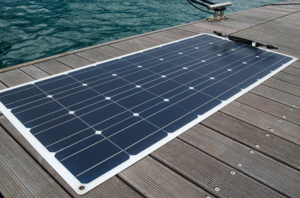 Flexible polycrystalline solar panel for yachts on the berth deck stock photo