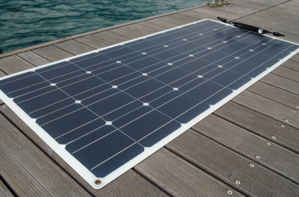 Flexible polycrystalline solar panel for yachts on the berth deck stock photo