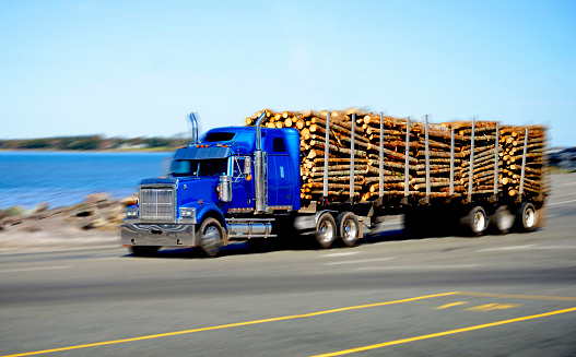 Semi-truck transporting logs. Nova Scotia, Canada.