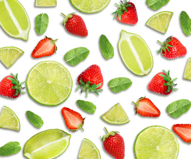 istock Layout with fresh limes, strawberries and mint leaves on white background, top view 1363468403