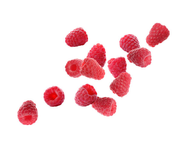 istock Fresh ripe raspberries flying on white background 1363468428