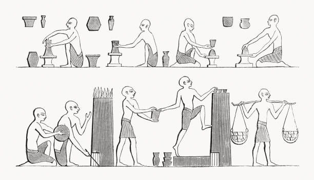Work of potters in ancient Egypt, wood engraving, published 1862 The work of potters in ancient Egypt. Wood engraving after an ancient Egyptian mural, published in 1862. drawing of slaves working stock illustrations