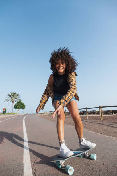 istock Cheerful skater young woman 1363472986