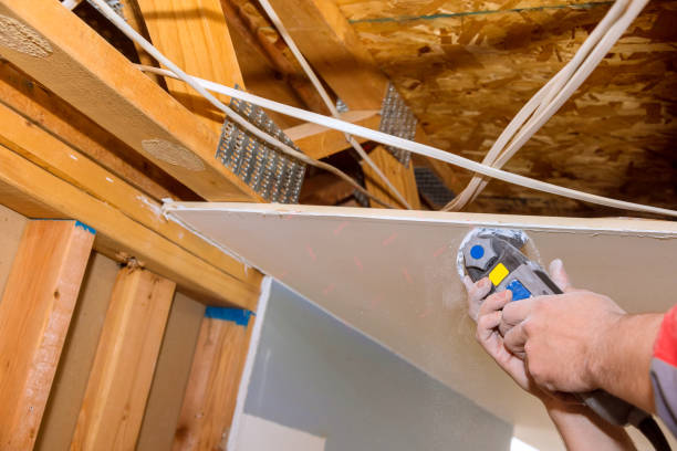 istock Cutting plasterboard plaster hand sawzall tool 1363473045