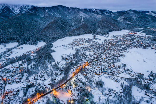 istock Zakopane Snow Covered Cityscape with Giewont Mount. Drone View 1363473047