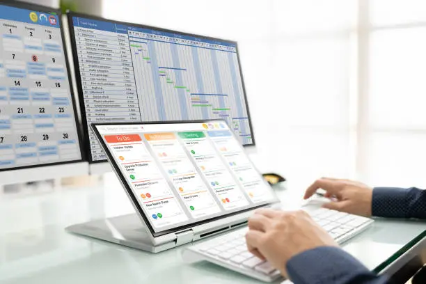 Kanban Project Management Software On Laptop. Digital Calendar Schedule