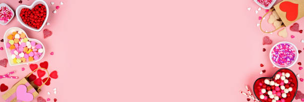 istock Valentines Day candy double border on a pink banner background 1363479299