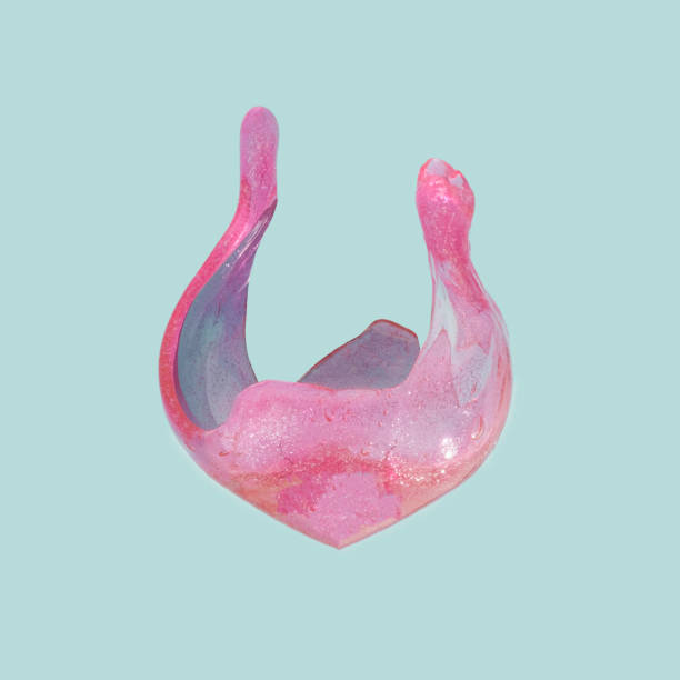 istock Pink and violet heart shaped  slime dripping upwards. 1363479455