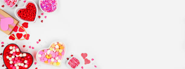 istock Valentines Day candy corner border on a white banner background 1363479560