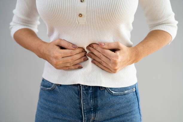 Diverticulitis Infection Or Inflammation In Intestines Diverticulitis Infection Or Inflammation In Intestines. Woman With Colitis colorectal cancer photos stock pictures, royalty-free photos & images