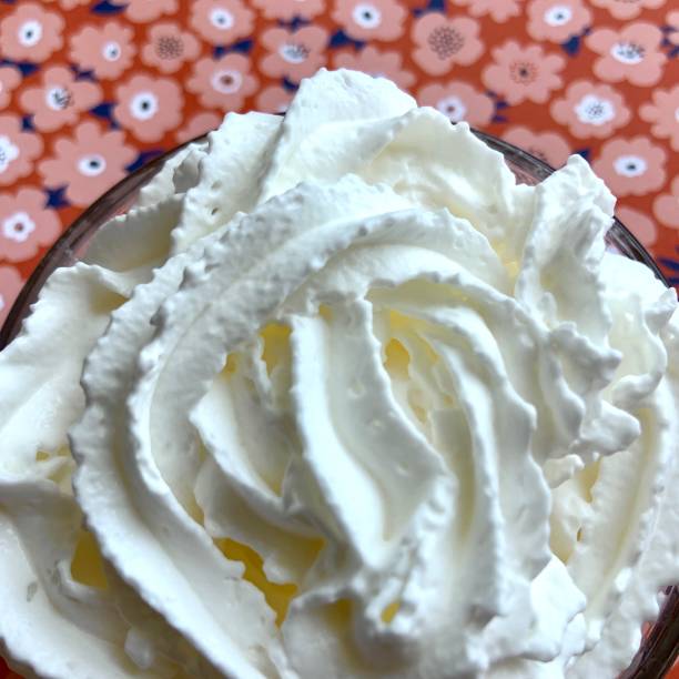 istock Whipped Cream in Glass Bowl 1363484076