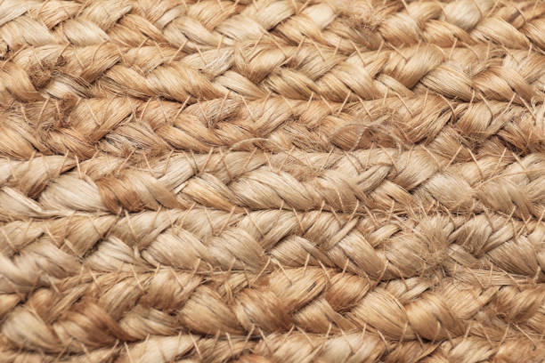 istock Elegant woman's straw bag as background, closeup 1363489533