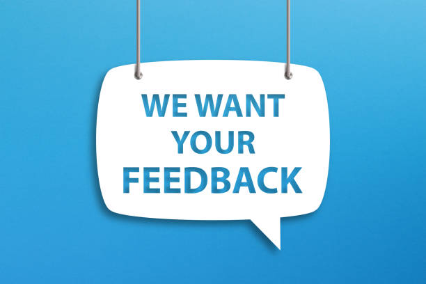 istock We Want Your Feedback written in speech bubble on blue background 1363497102