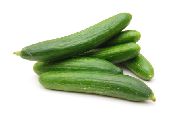 istock Cucumber and slices isolated over white background. 1363505046